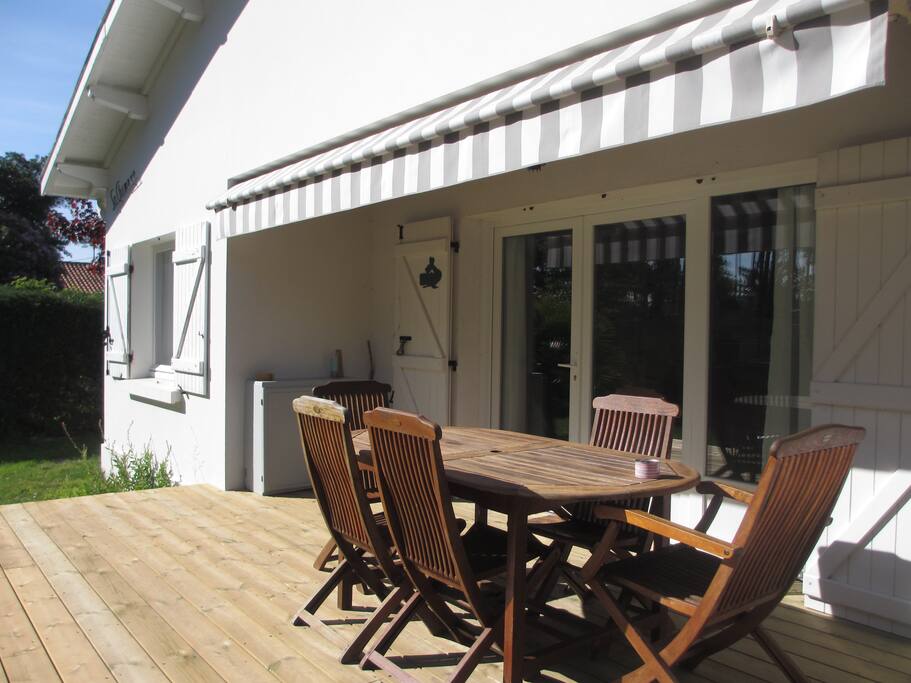 Terrasse avec store banne