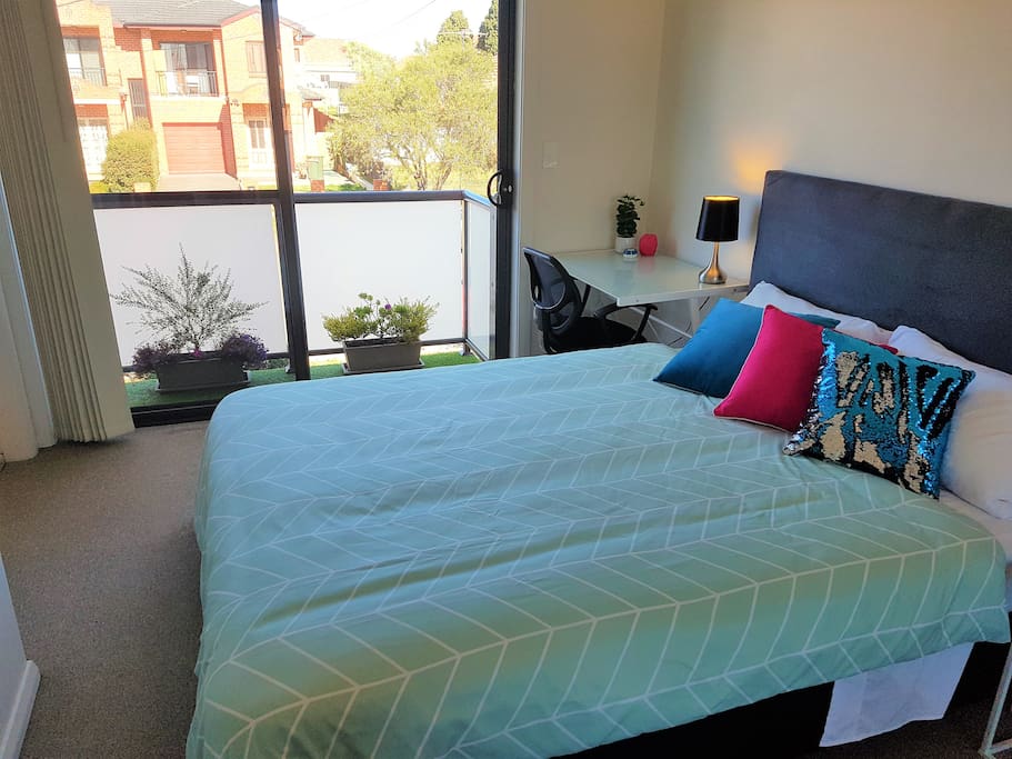 Cozy bedroom with balcony