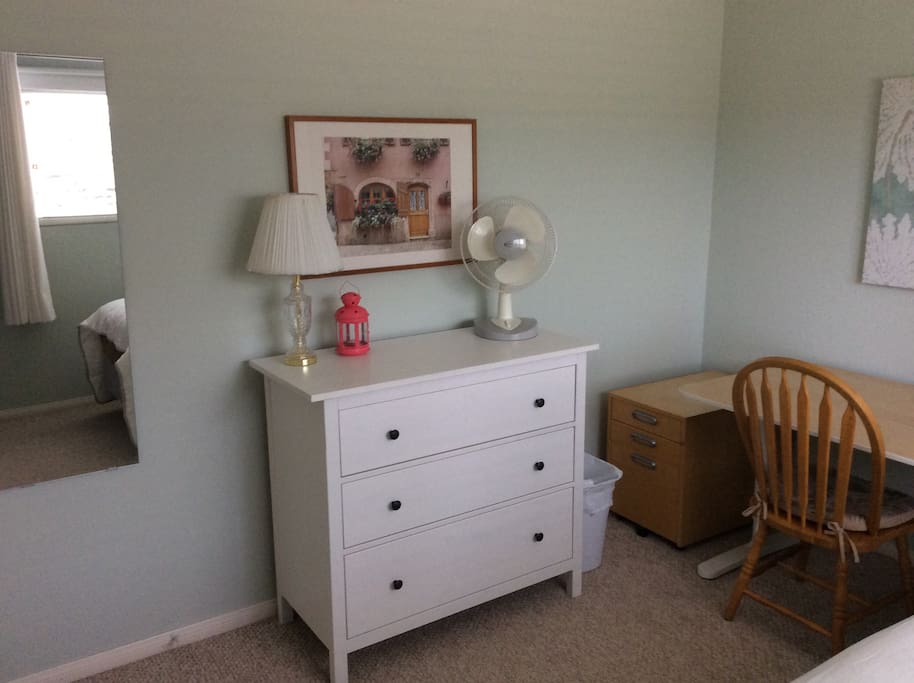 Dresser has top two drawers available for guest use.
