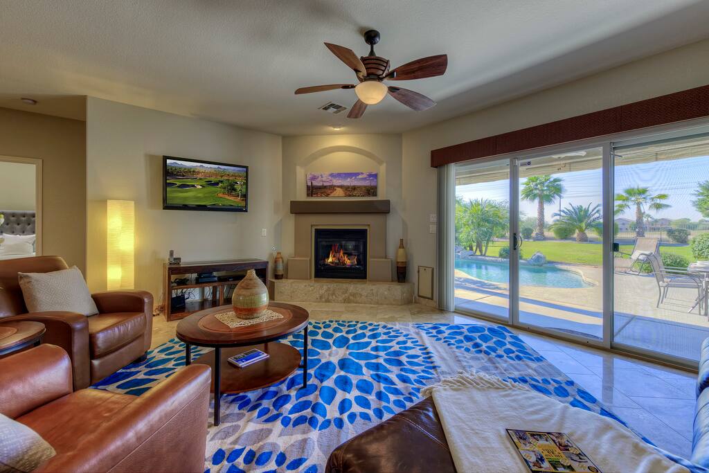 Large Living Room that opens up to private backyard and views of the Golf Course.
