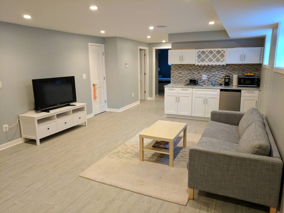 Couch, TV, mini bar with fridge.