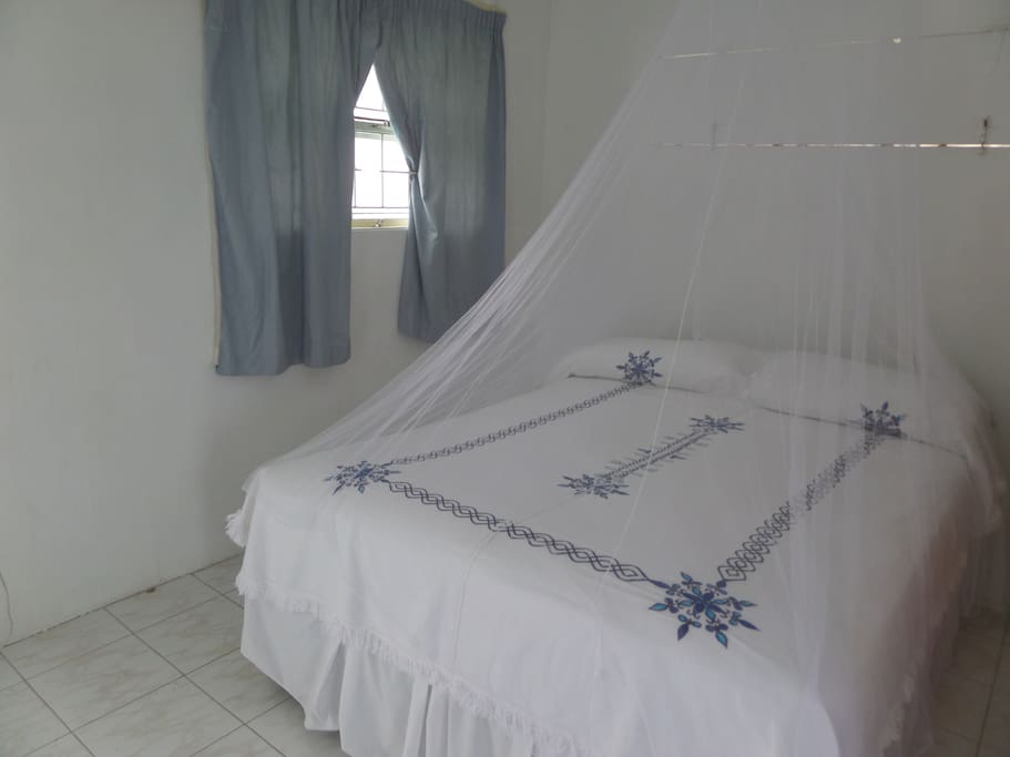 Double bed with mosquito net