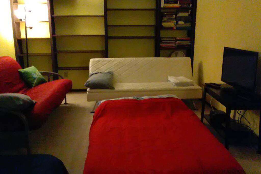Sleep on the fold out futon, fold out couch or there's floor space for 1 or 2 air mattresses.