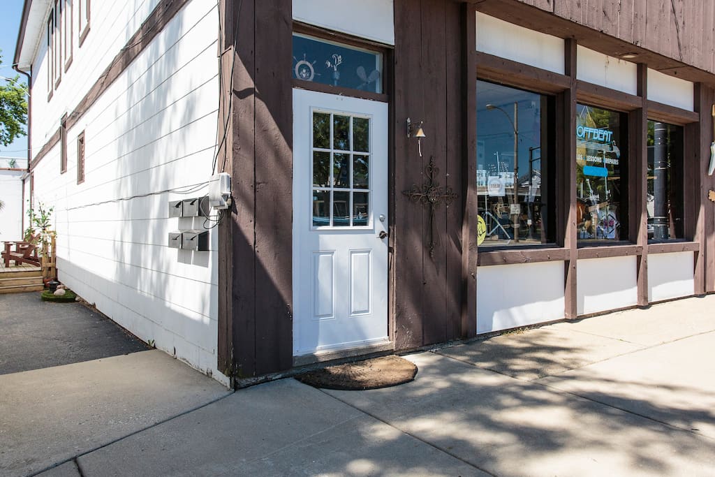 Entrance to Take A Pebble Apartments
