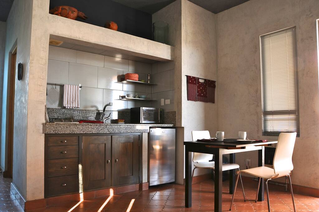 Kitchen and dining area adjacent to patio.