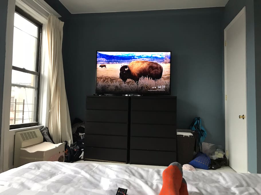 View from the master bed. Google chrome for streaming, Netflix, HBO etc on the 64” Sony Bravia. Closet to the right