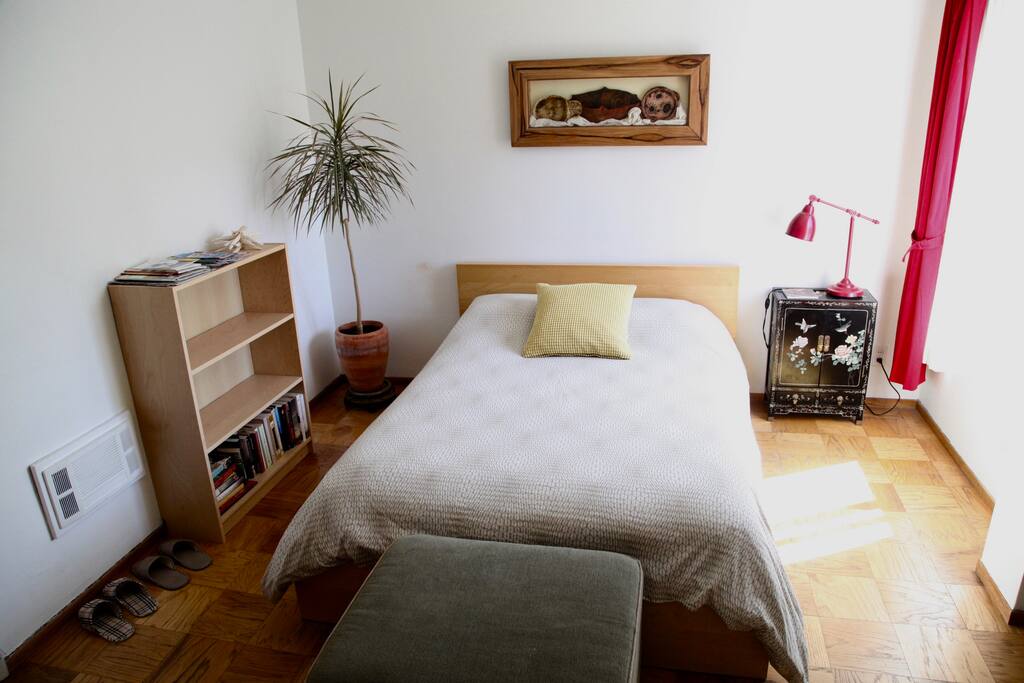 The full-size bed has an organic, pillowtop mattress