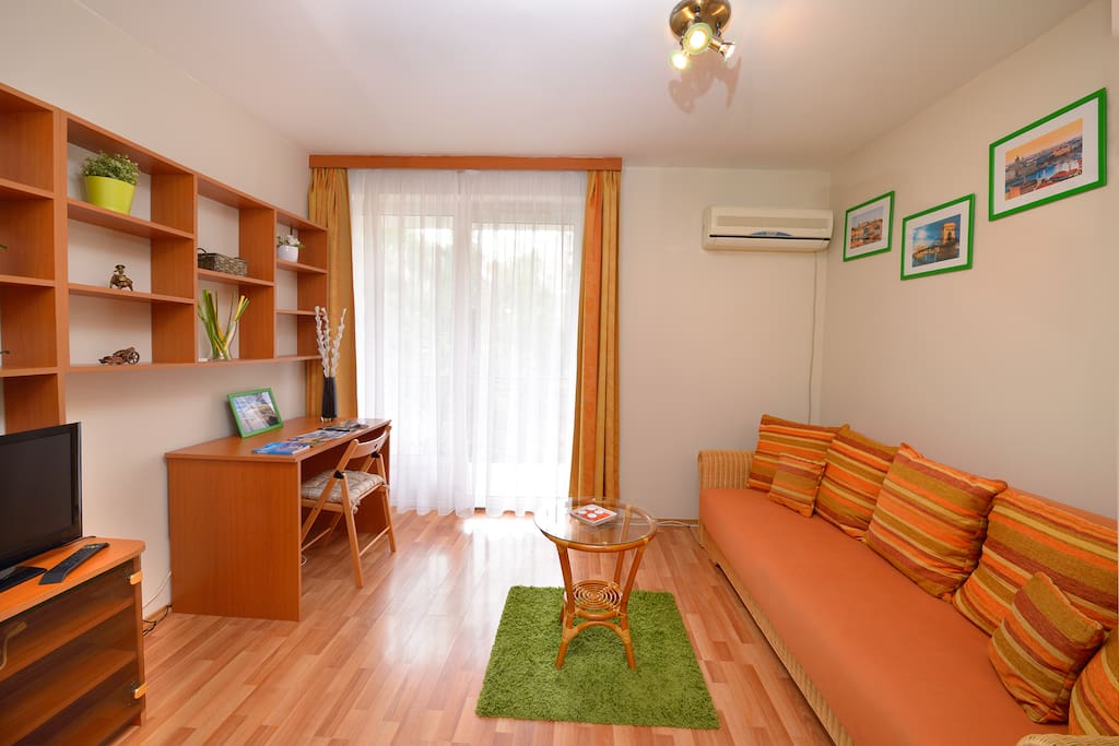 Living Room with and LCD Tv and free wifi
