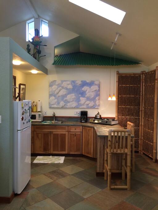 Bar seating, coffee maker with starter coffee provided.