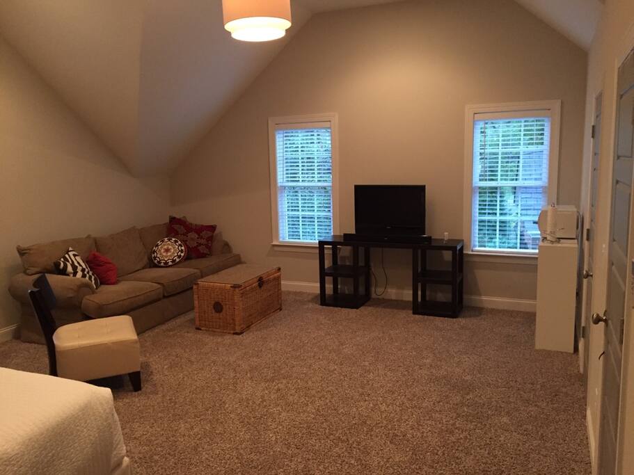 Comfortbale couch and 40 inch tv with digital cable and high speed internet