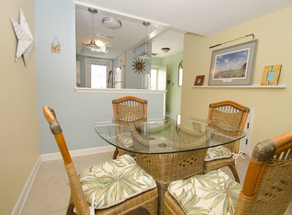 The dining has seating for 4 and is open to the living area.