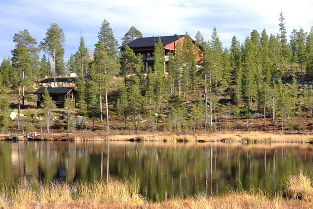 Marjarinne house and lakeside sauna seen from the other side of lake Martinjärvi