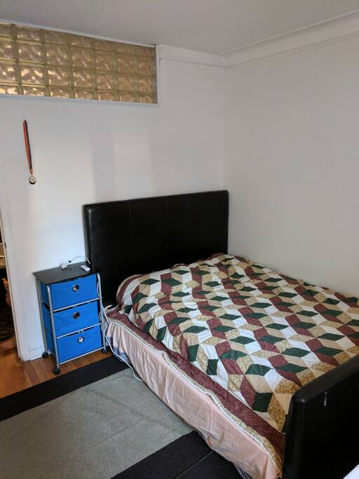 Comfortable bed with nightstand