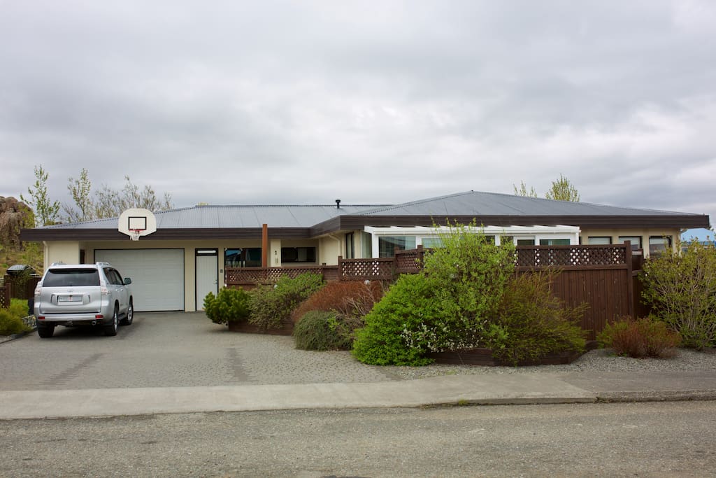 Parking for guests are on the right in the driveway.