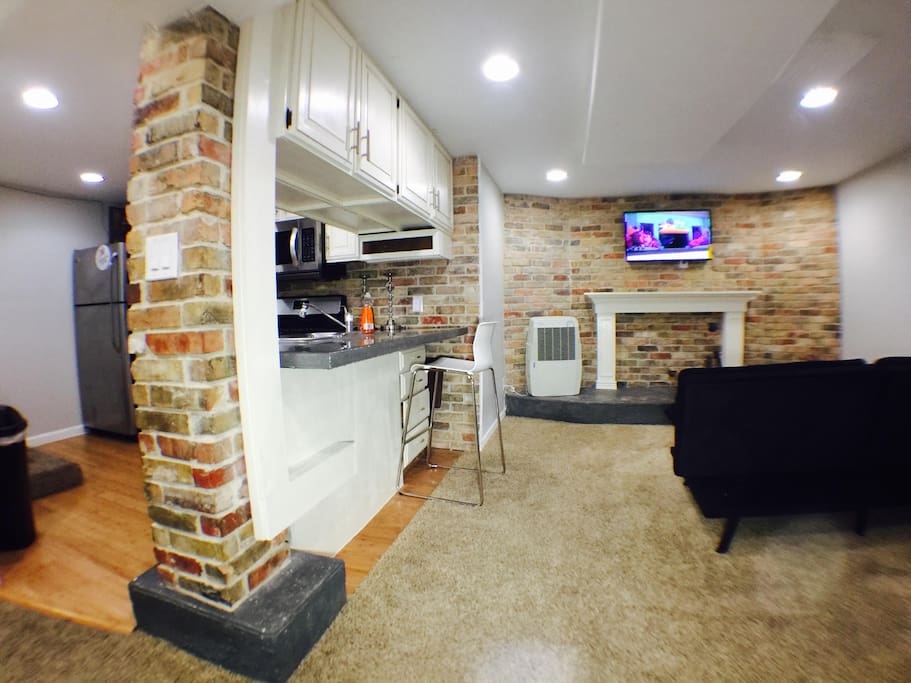 Main room, showing TV and bar counter.