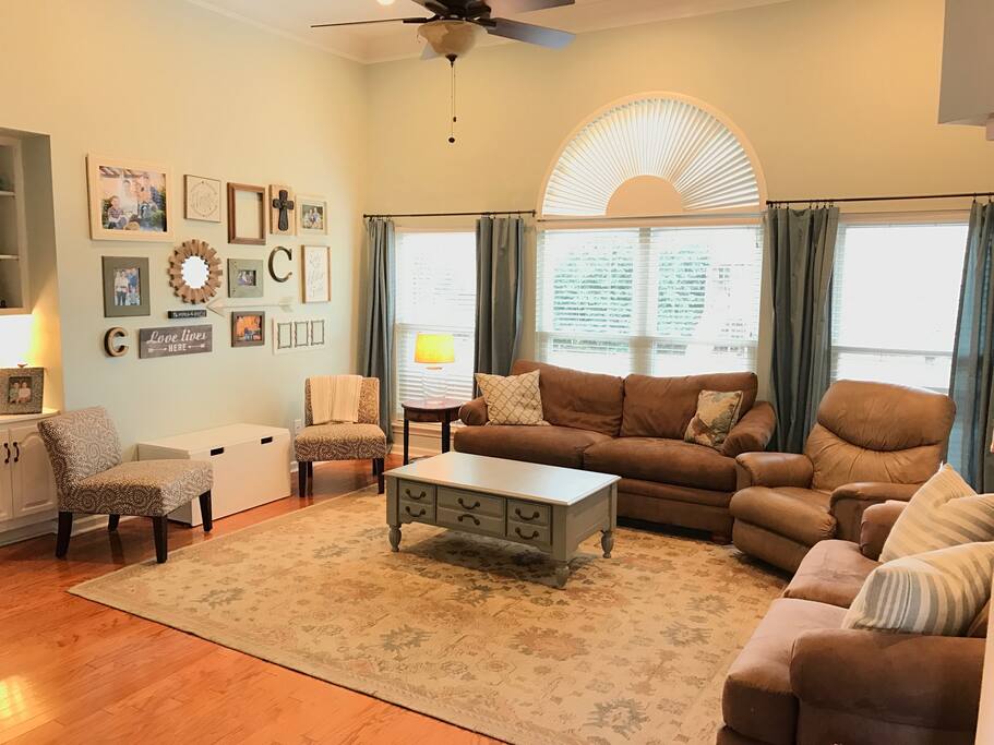 Large Den with gas fireplace. Large windows look into back yard. Lots of room for your guests to stretch out and get comfortable.