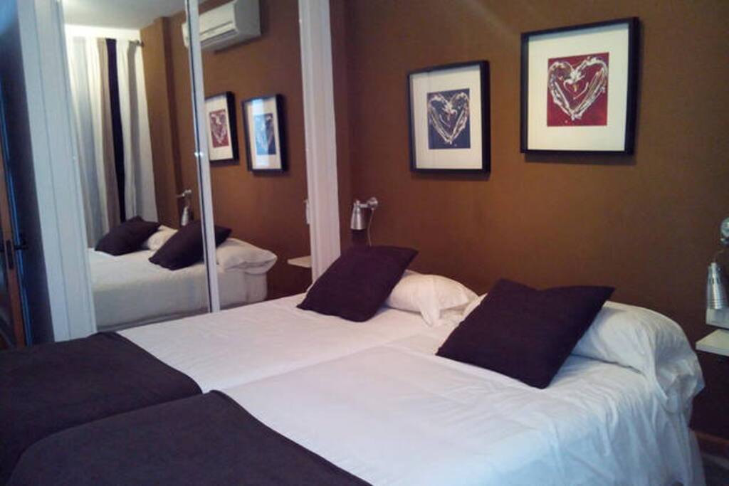 Dormitorio dos camas individuales
