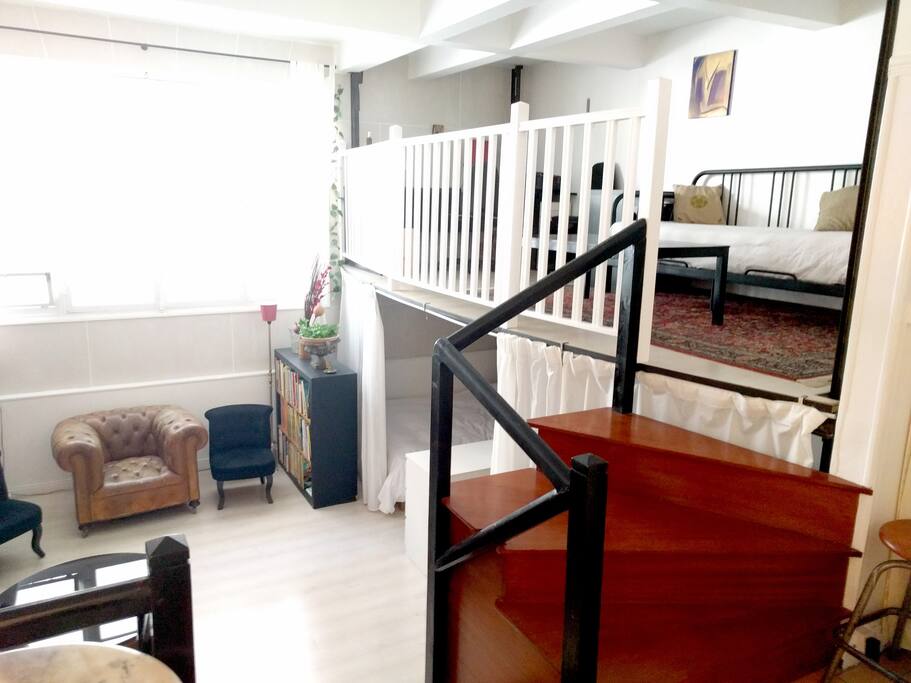 The mezzanine hosts an "office" area and a sofa bed.