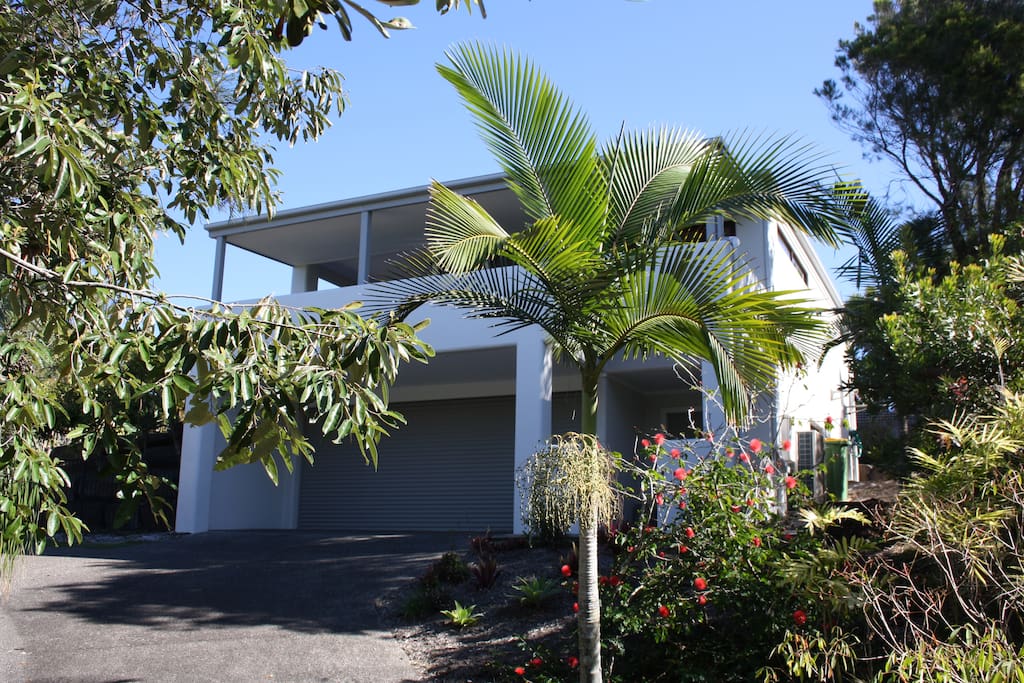 The house is tucked away in the high corner of a quiet cul-de-sac minutes away from the beach