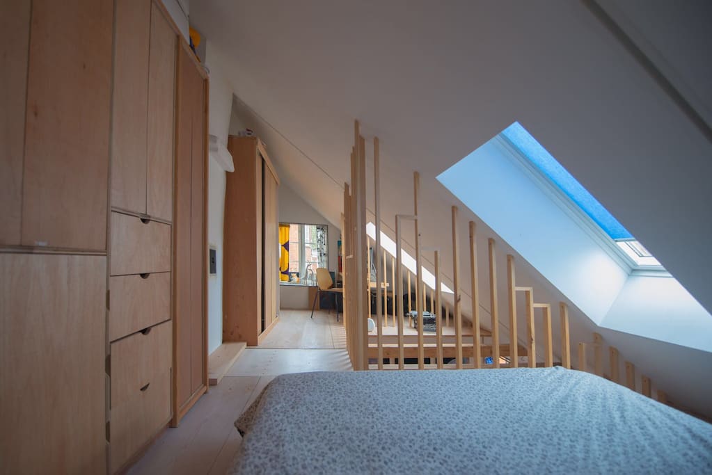 The upper level of the apartment with masses of light and comfortable king size bed