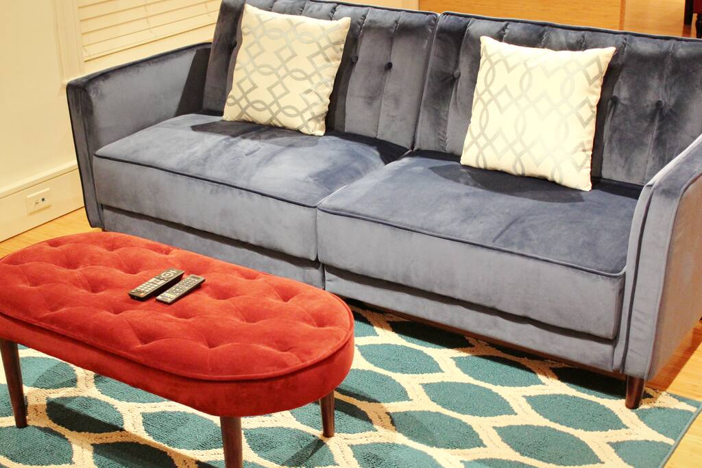 The Living Area features dimmable lighting and Modern Furniture