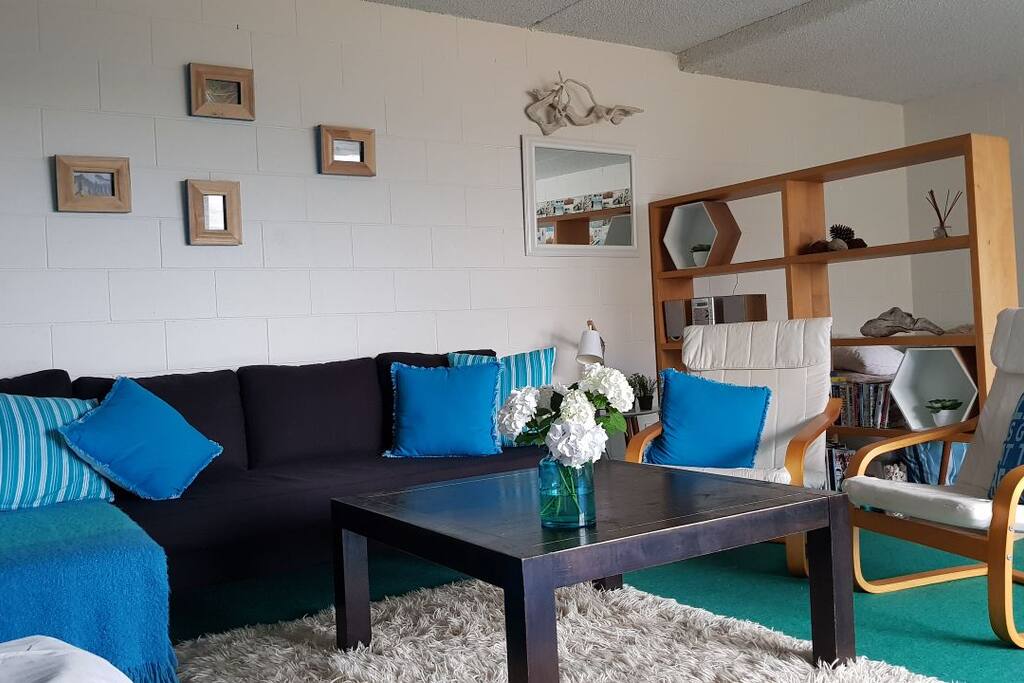 comfy seating, tv, books and movies