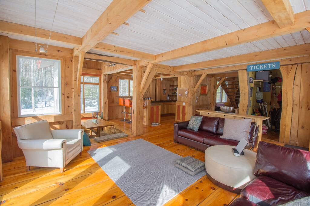 The 46” flat-screen TV and wood-burning stove in the living room