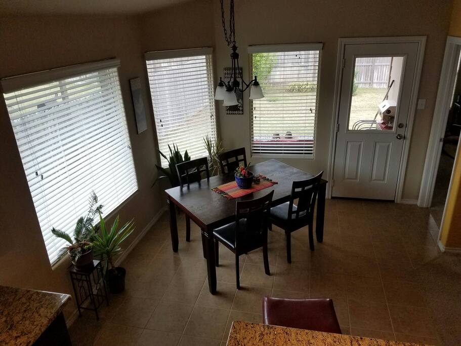 The dinning area is in a convenient location that is bright and cheery with lots natural light.