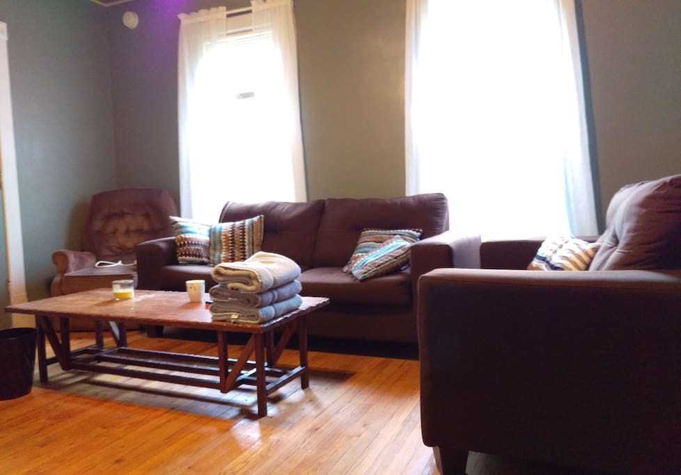 Living room with couch, love seat and recliner