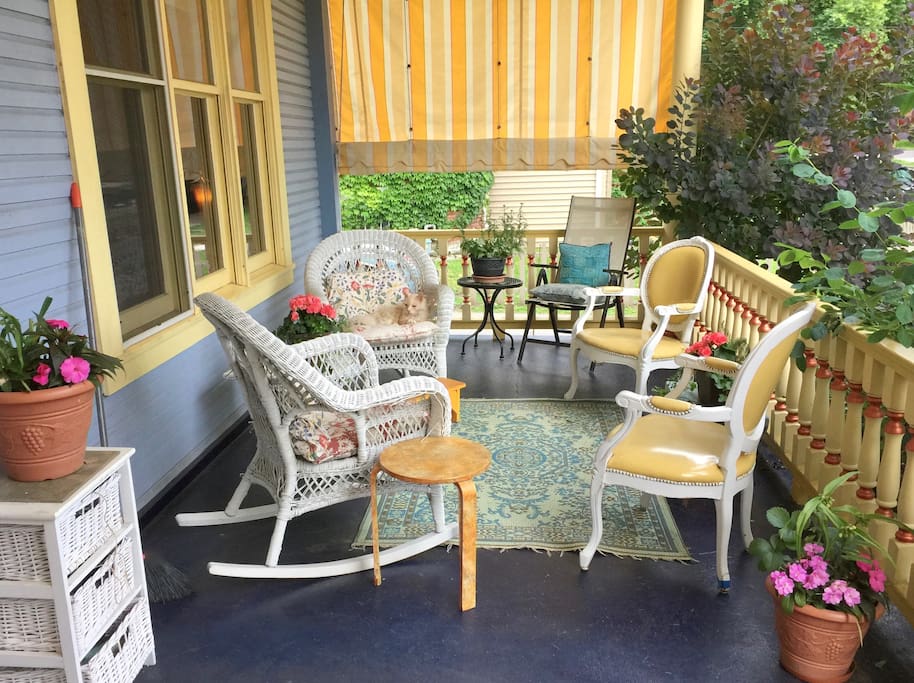 The charming front porch is your extra 3-season living room.