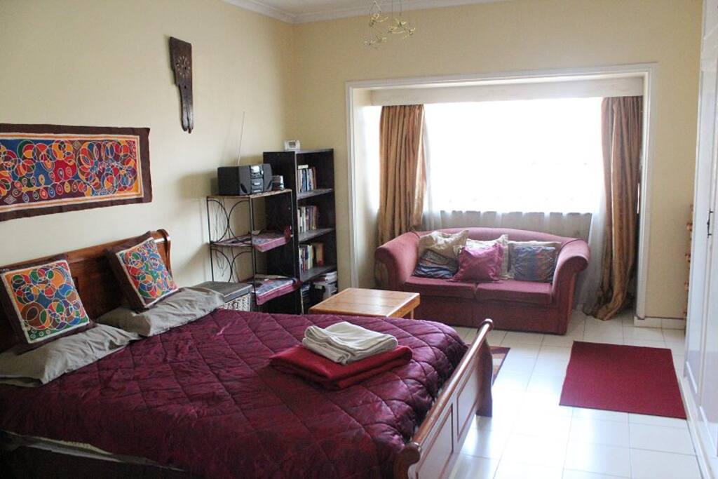 Bedroom - window overlooks front of building/street.