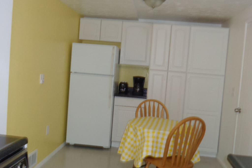 Far end of Kitchen, small table for coffee in the morning.
