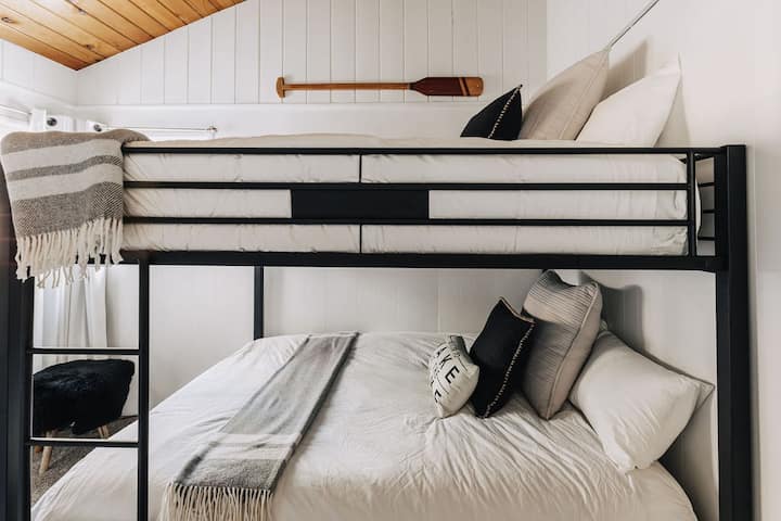 guest bedroom with queen bunk beds