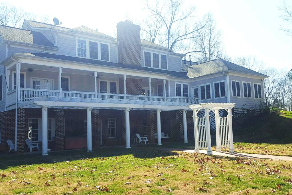 this is the very back of our home and a picture of HomeAwau, which is in the basement.It shows the driveway and private entrance.