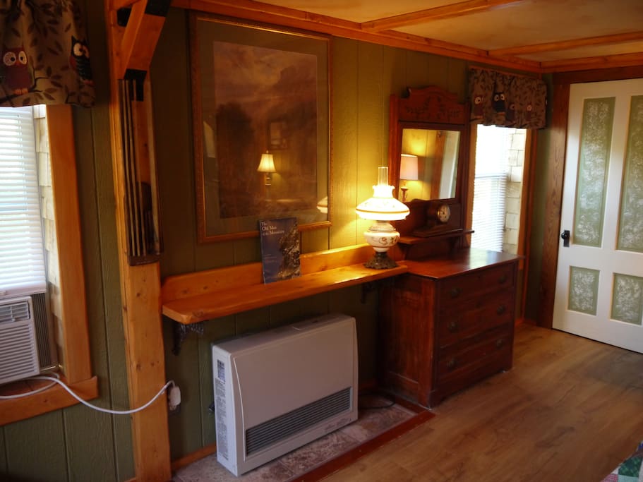 heater and antique dresser and closet door