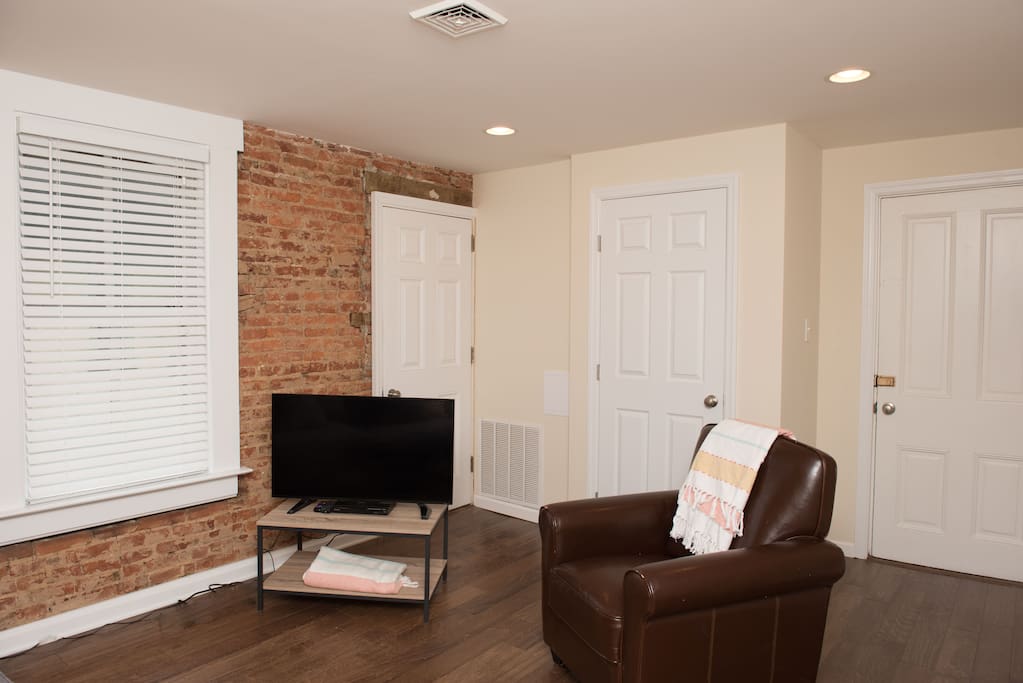 Exposed brick and wood floors add to the charm of this unit.