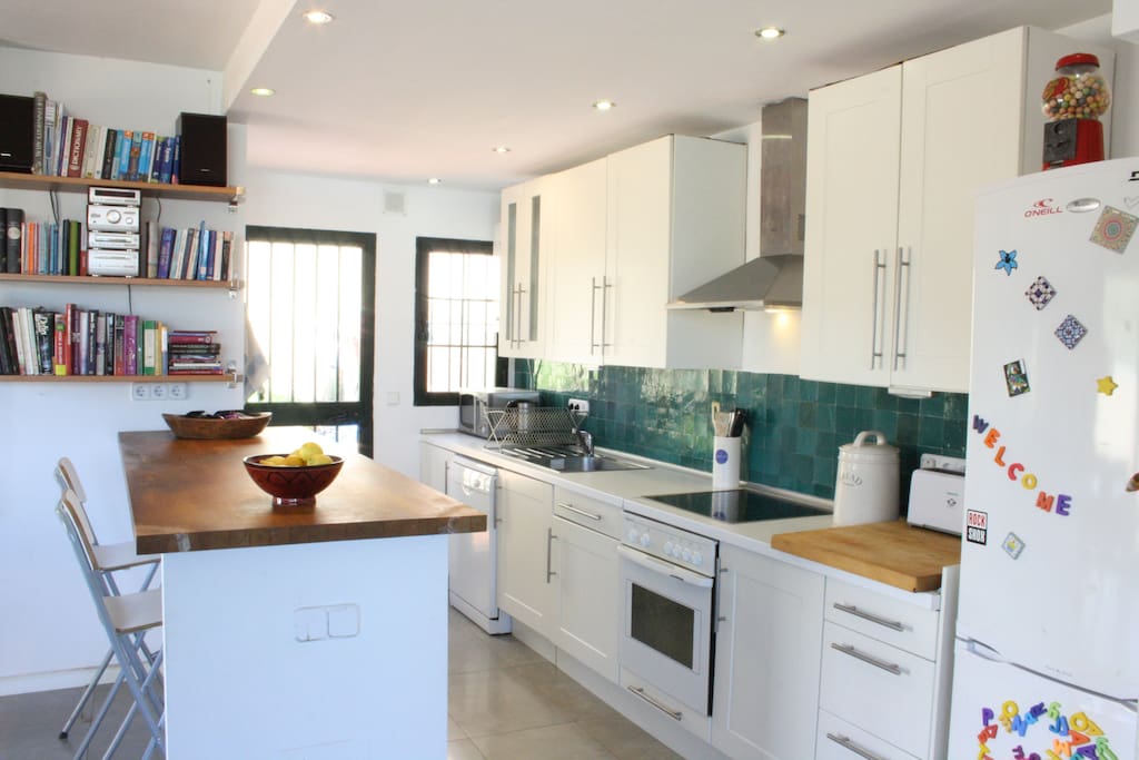 Kitchen with dish washer, oven, toaster etc
