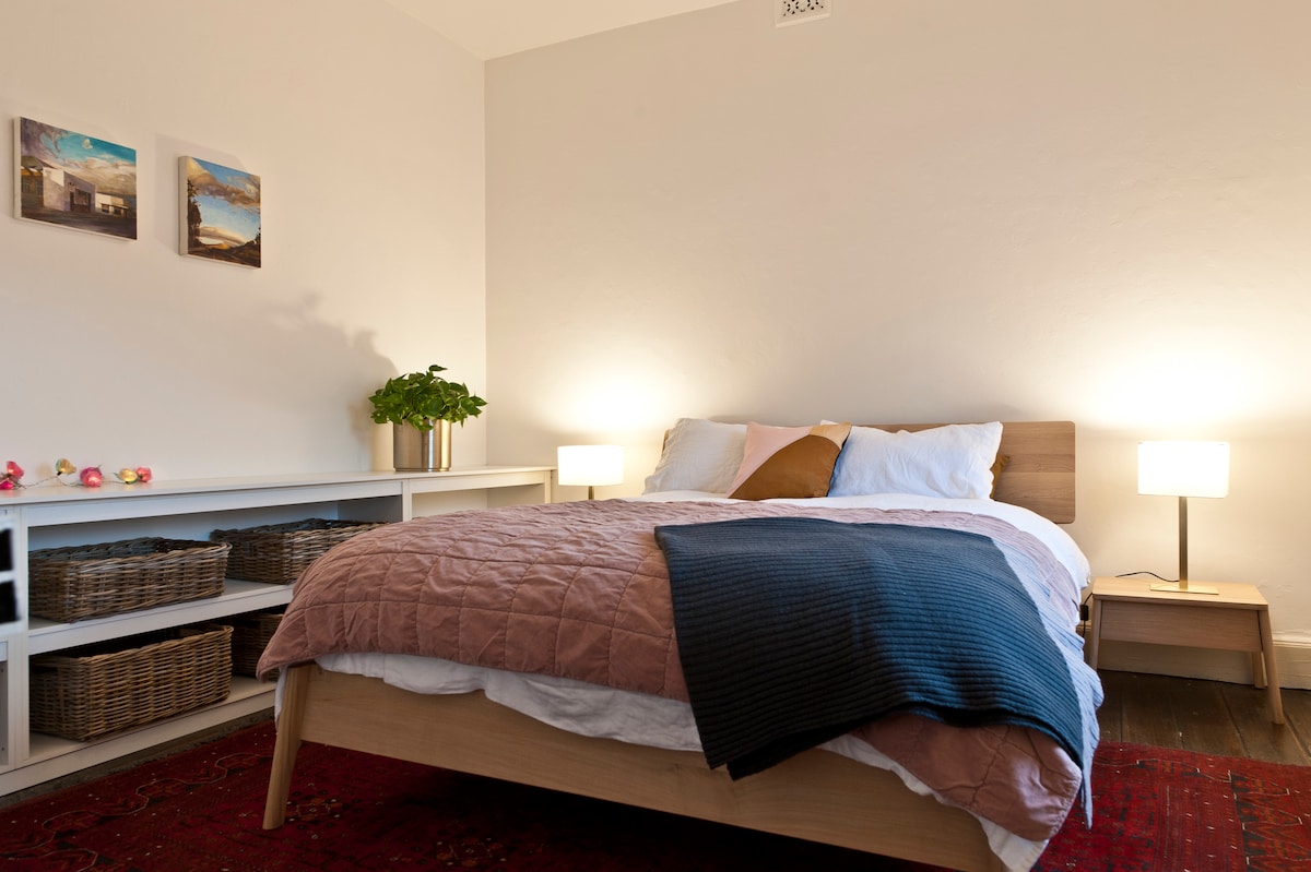 Queen bed with luxurious linen