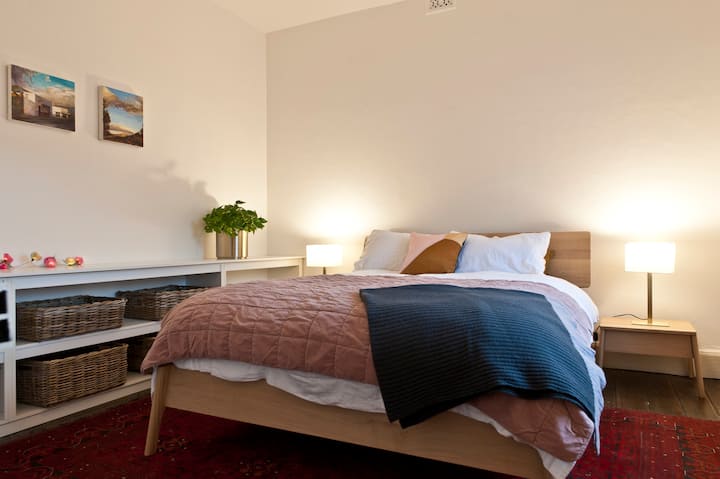 Queen bed with luxurious linen