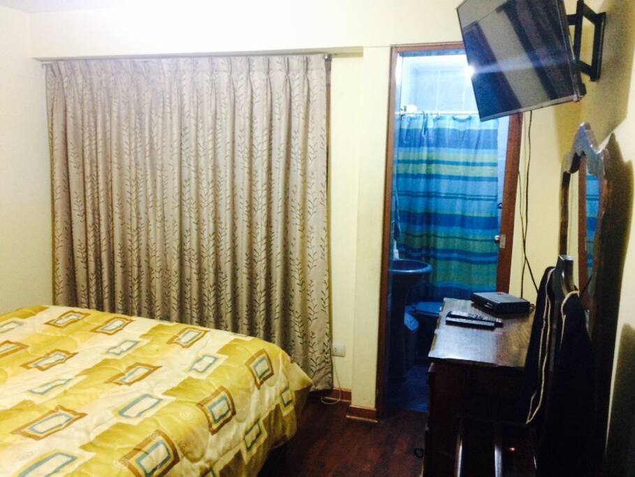 Ventana y baño privado