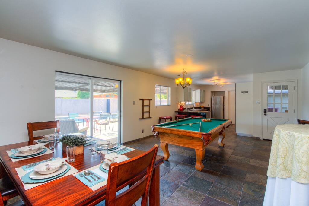 Open dining area with large table to enjoy meals with your group.