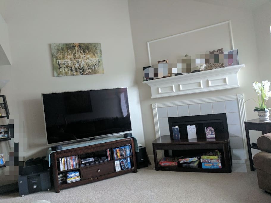 living room downstairs has a new 65inch tv with Netflix, Hulu, hbo, local cable and lots of dvd's.