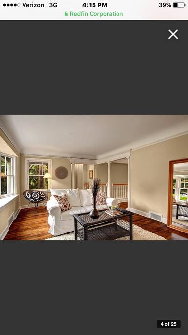 Formal living room with a large Crate and Barrel couch.