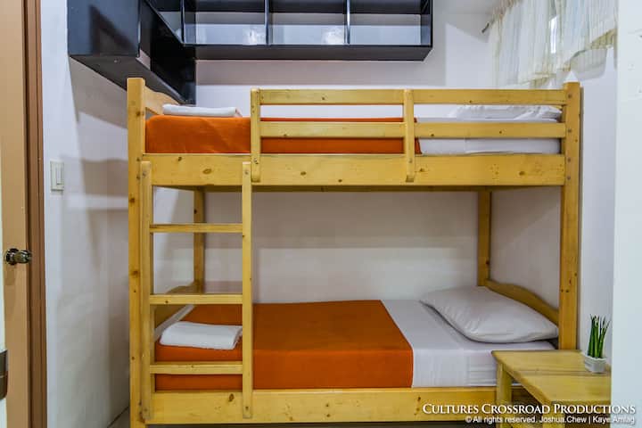 Bedroom # 3 is accessed through the kitchen.