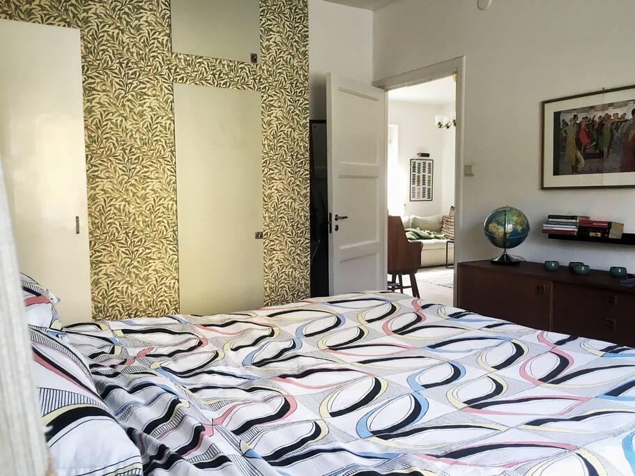 Large bedroom with view to livingroom