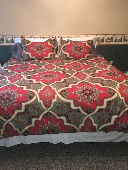 Comfortable king pillow top bed.