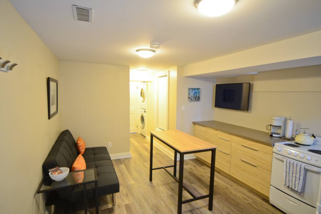 Living area and fully-equipped kitchen