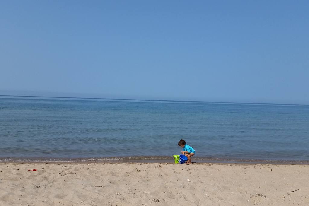 Sandy beach. Beautiful clear water