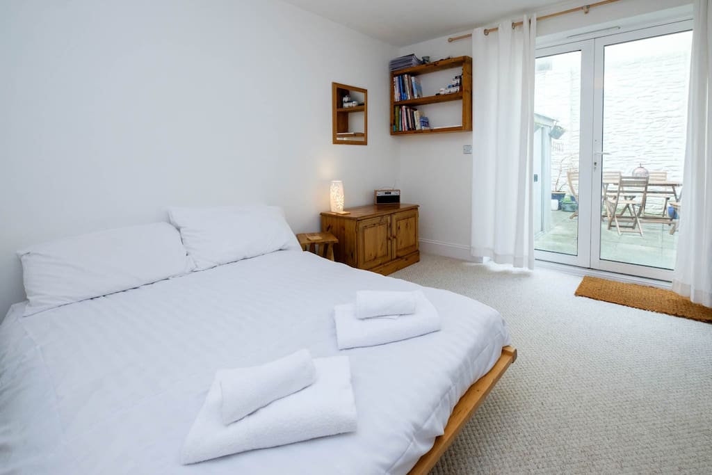 The bedroom on the ground floor with garden access