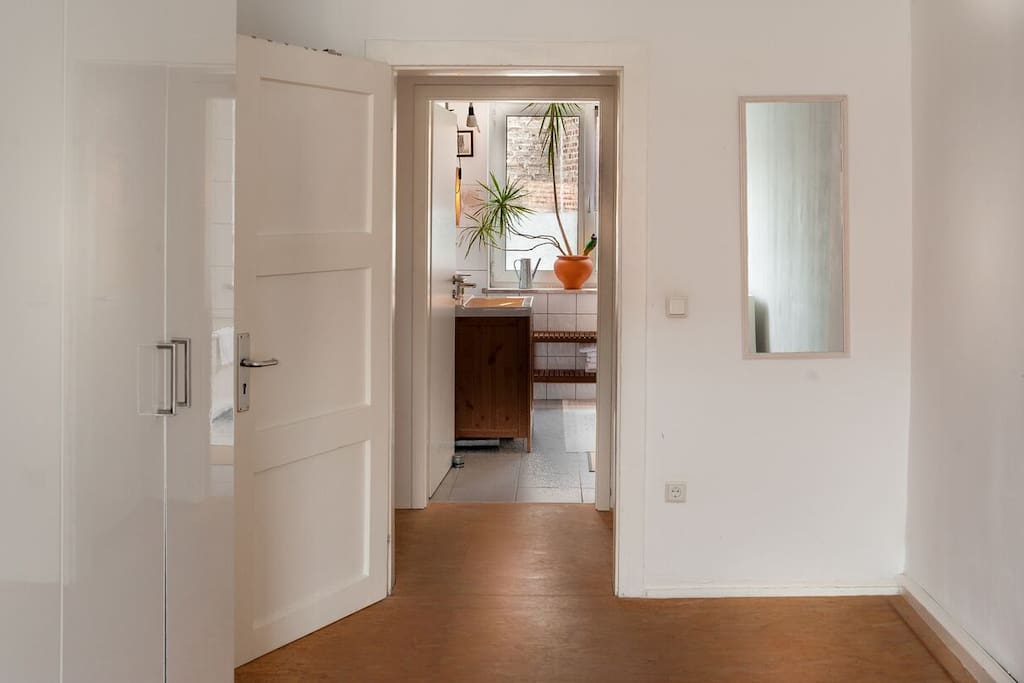Bedroom towards bathroom across the floor